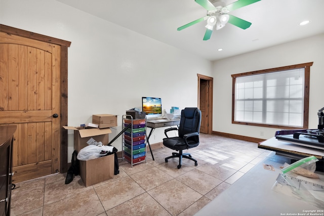 office featuring light tile patterned flooring and ceiling fan