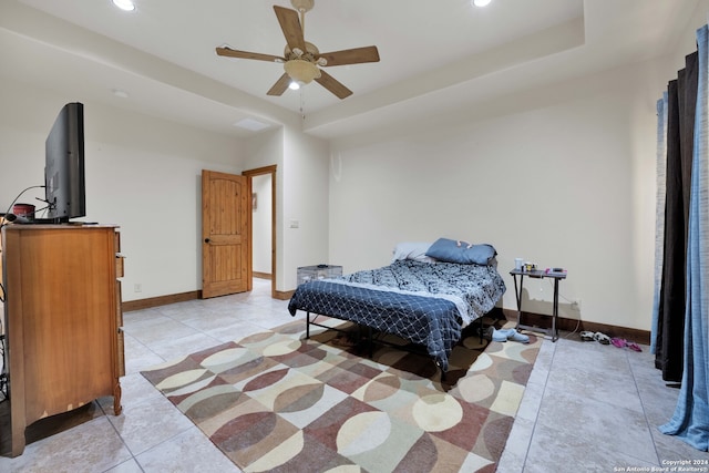 bedroom featuring light tile patterned floors and ceiling fan