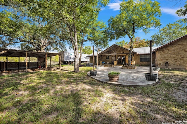 view of yard with a patio area