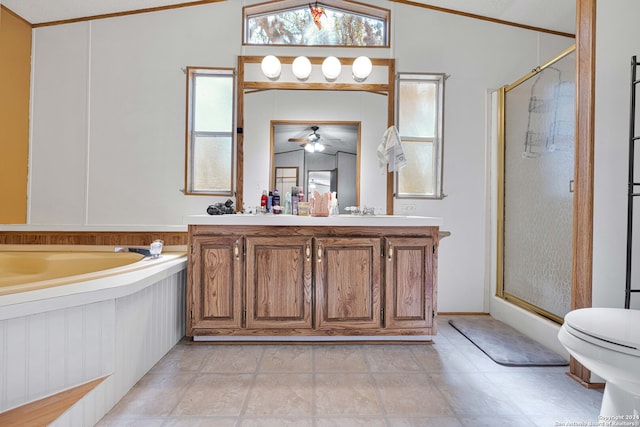 full bathroom with separate shower and tub, toilet, ceiling fan, vaulted ceiling, and vanity