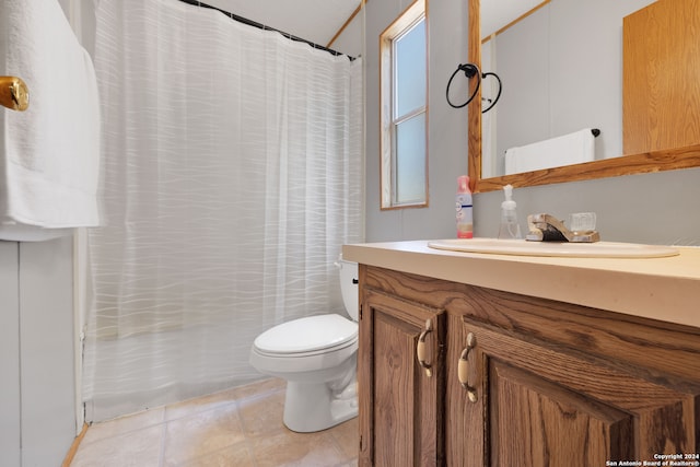 bathroom featuring vanity, toilet, and tile patterned floors