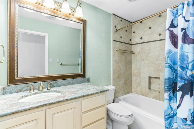 full bathroom featuring vanity, toilet, and shower / bathtub combination with curtain