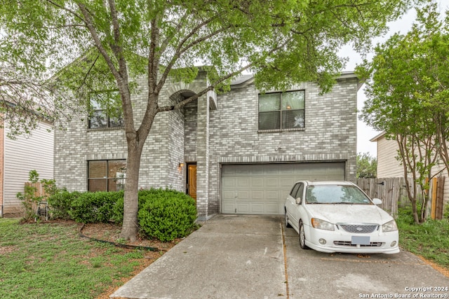 view of front of home with a garage