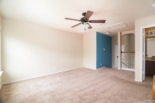 spare room with light colored carpet