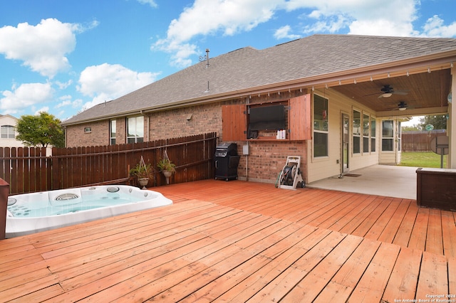 wooden terrace with a grill and ceiling fan