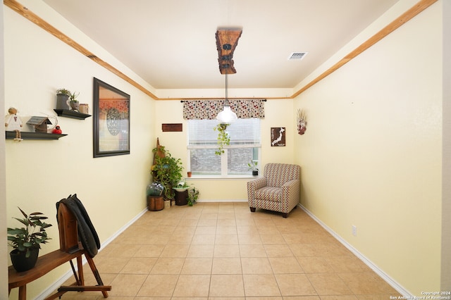 living area with light tile patterned floors