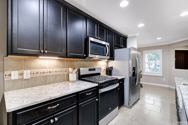 kitchen with light stone counters, light tile patterned floors, backsplash, ornamental molding, and stainless steel appliances