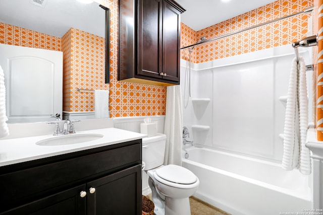 full bathroom with vanity, toilet, and shower / bathtub combination with curtain