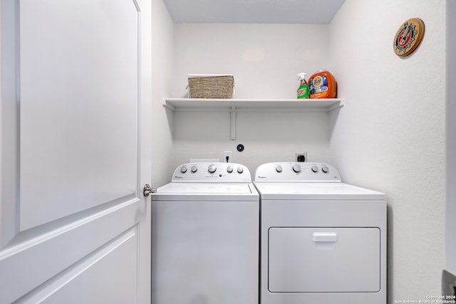 washroom featuring independent washer and dryer