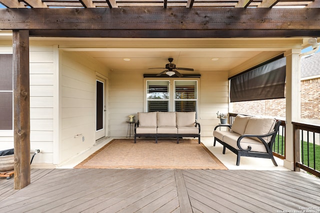 wooden deck with a pergola, ceiling fan, and an outdoor hangout area