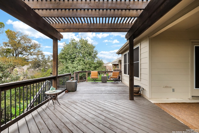 wooden terrace featuring a pergola