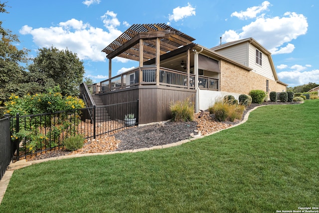 view of side of home featuring a yard and a pergola