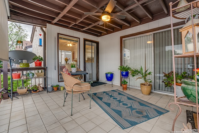 view of patio featuring ceiling fan