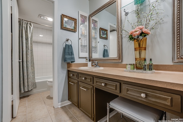 full bathroom with vanity, shower / tub combo with curtain, toilet, and tile patterned flooring