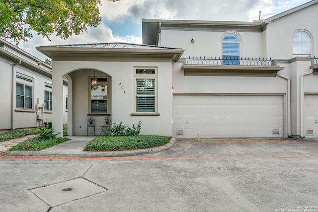 view of front of property with a garage