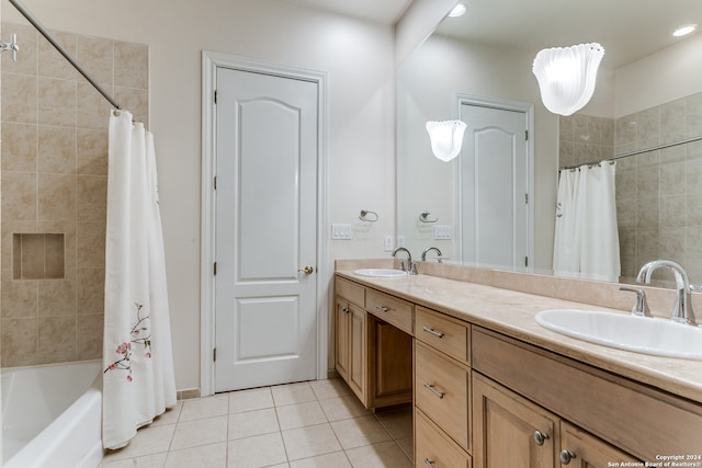 bathroom with vanity, tile patterned floors, and shower / bath combination with curtain