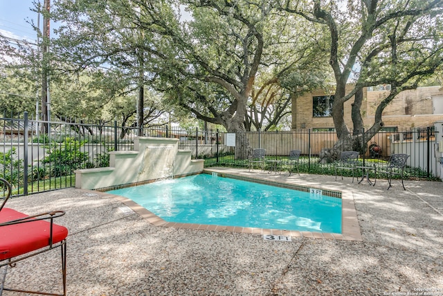 view of pool with a patio area