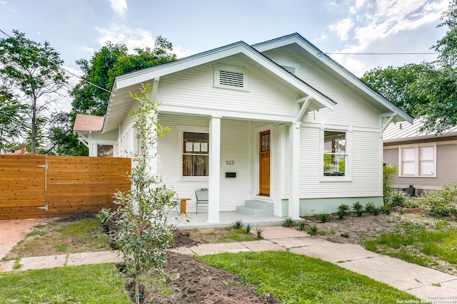 view of front of property featuring covered porch