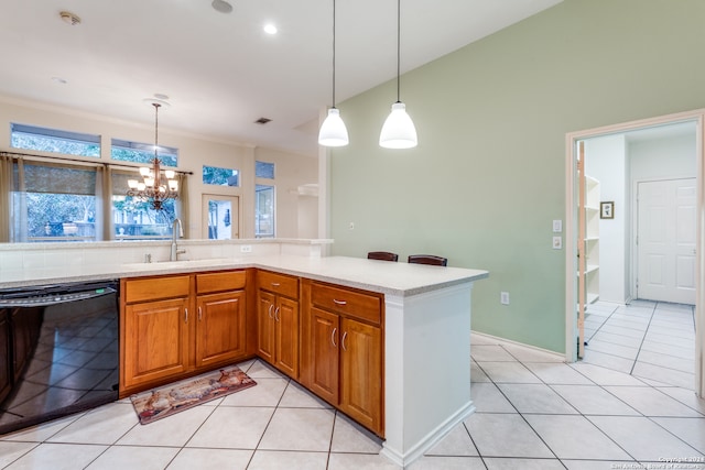 kitchen featuring sink, black dishwasher, a chandelier, pendant lighting, and light tile patterned flooring