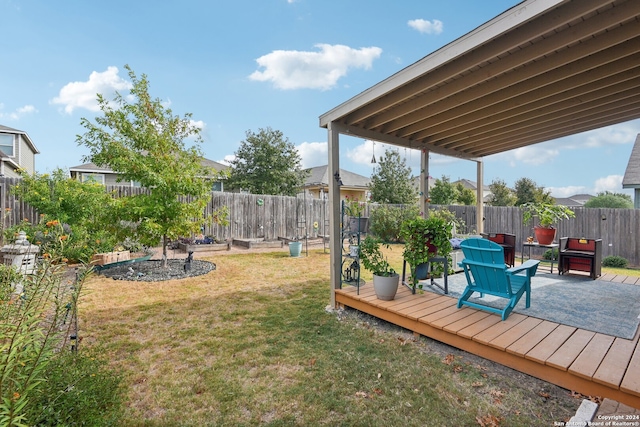 view of yard with a deck