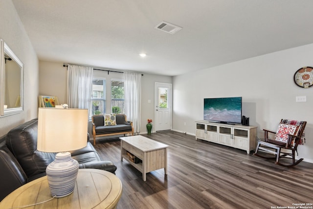 living room featuring dark hardwood / wood-style floors