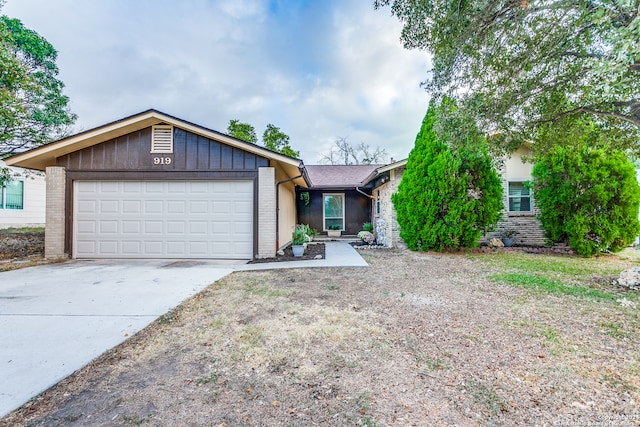 single story home featuring a garage