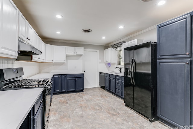 kitchen with ornamental molding, white cabinets, black appliances, and sink