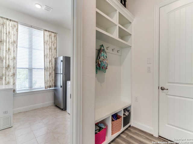 mudroom with a healthy amount of sunlight