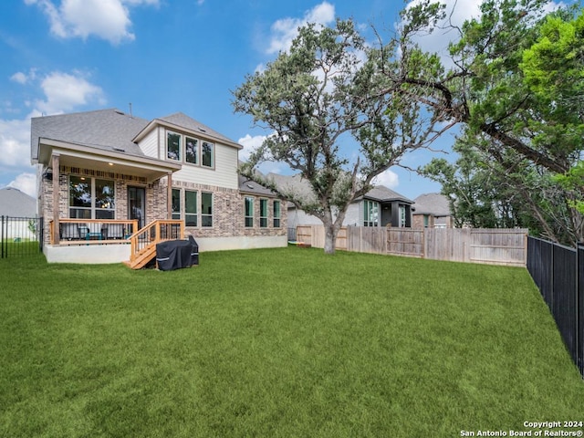 back of property with stone siding