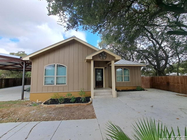 view of front of house with a pergola