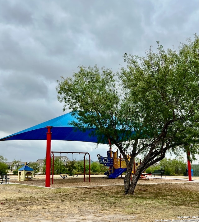 surrounding community featuring a playground