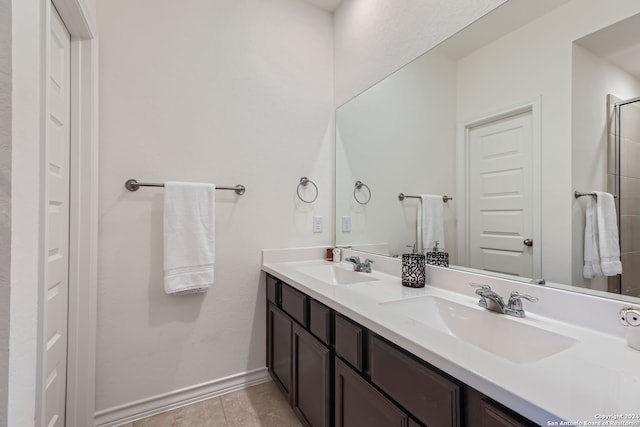 bathroom featuring vanity and tile patterned flooring