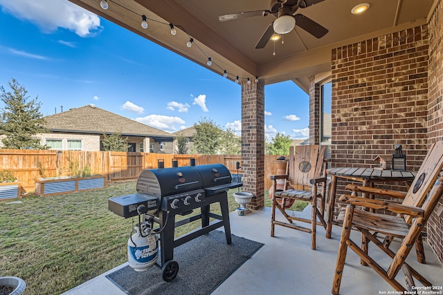 view of patio / terrace featuring area for grilling and ceiling fan