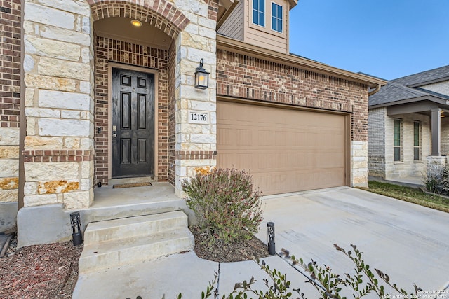 property entrance with a garage