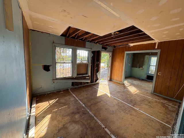 miscellaneous room with wooden walls