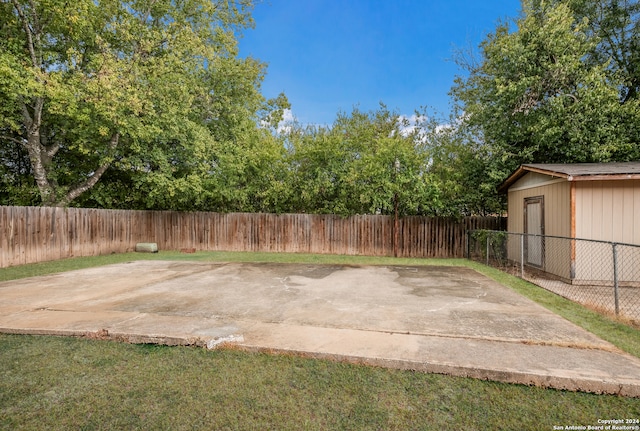 view of patio / terrace featuring a storage shed