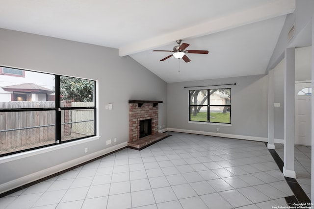 unfurnished living room with ceiling fan, vaulted ceiling with beams, light tile patterned floors, and a brick fireplace