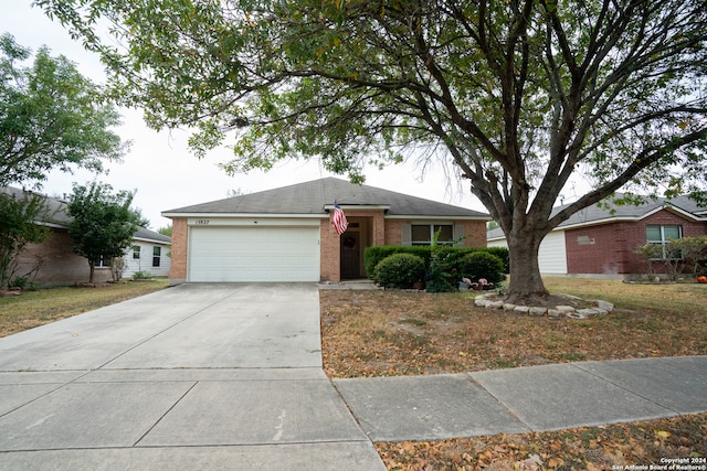 ranch-style house featuring a garage