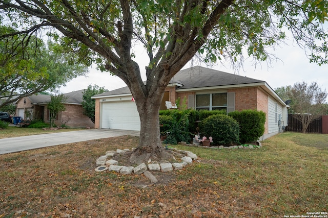 view of front facade featuring a front lawn and a garage