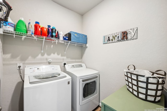 laundry area with washer and dryer