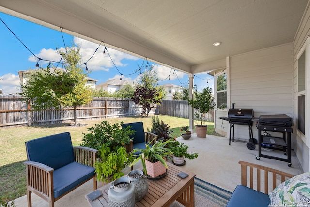 view of patio featuring a grill