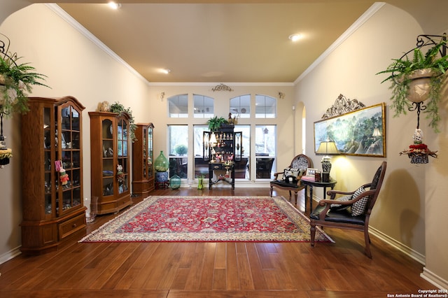 interior space featuring crown molding and wood-type flooring