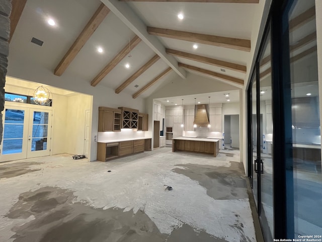 unfurnished living room featuring french doors, a chandelier, high vaulted ceiling, and beamed ceiling