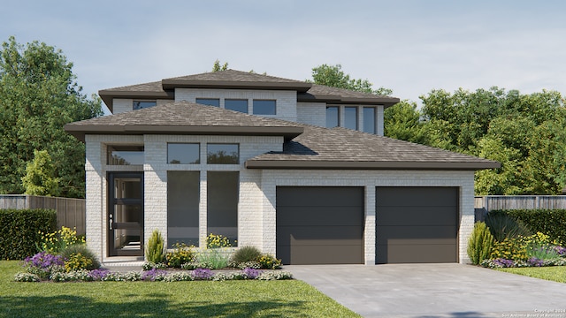 view of front facade featuring a front yard and a garage