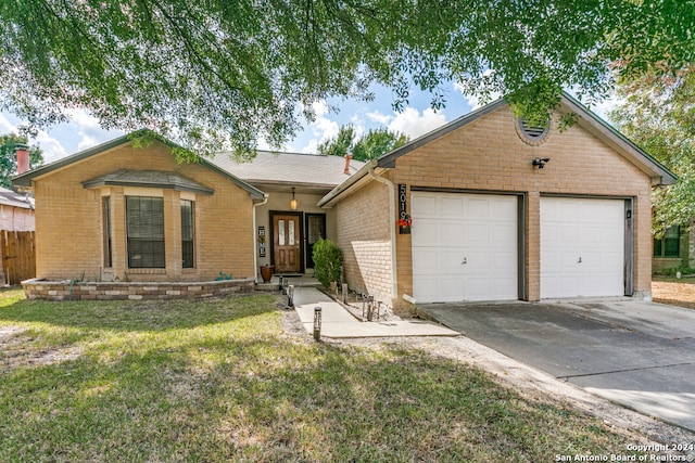 ranch-style house with a front lawn and a garage