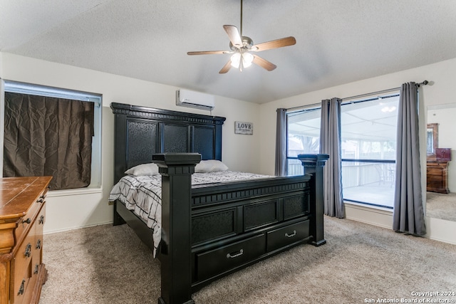 carpeted bedroom featuring an AC wall unit, a textured ceiling, and ceiling fan