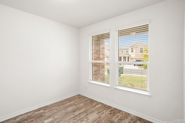 empty room featuring hardwood / wood-style floors