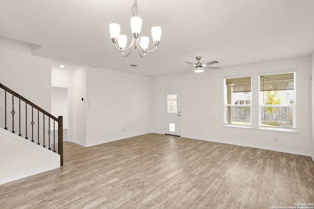 unfurnished living room with light hardwood / wood-style floors and ceiling fan with notable chandelier