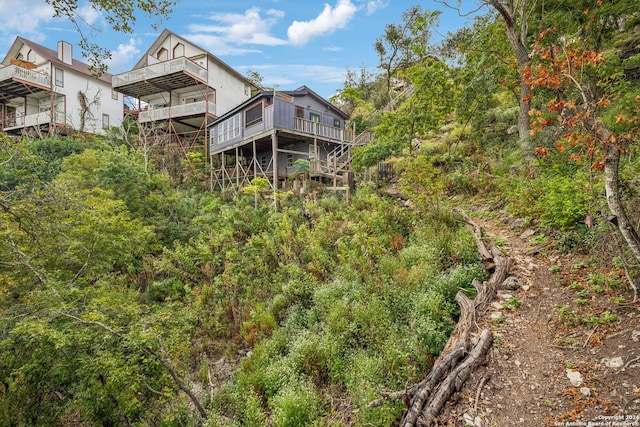 rear view of property with a deck