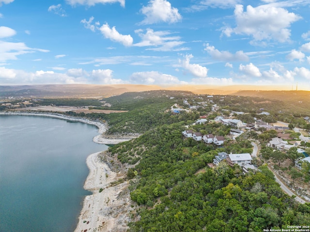 bird's eye view featuring a water and mountain view